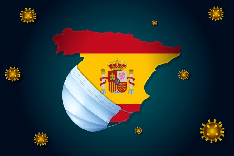 Mapa de España con la bandera española en una máscara del coronavirus nCoV - corona virus